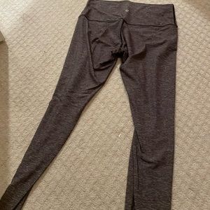 Gray lululemon leggings with dark seam.